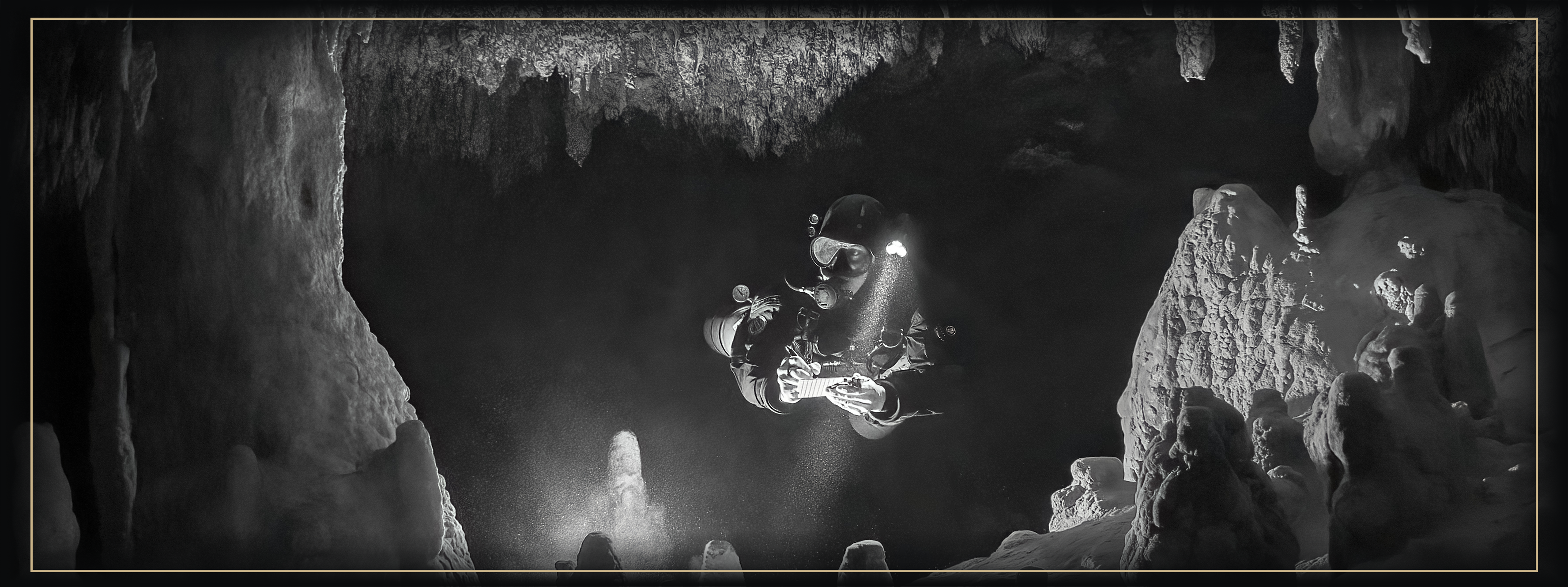 A cave diver completes an underwater cave survey at Cenote Dos Palmas.
